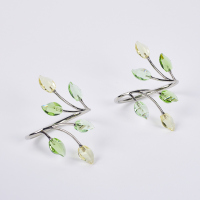 A Pair of Swarovski Leaves Napkin Rings