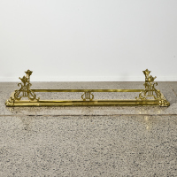 A Brass Fire Surround Fender