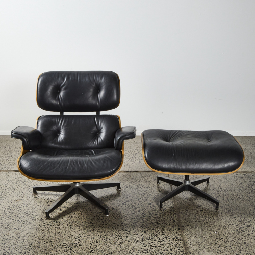 An Eames-Style Chair With An Ottoman