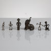 An Assortment of Five Bronze Figurines