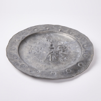 A Pewter Pressed Design Plate