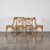 A Set Of Four Oak Cross-Back Chairs