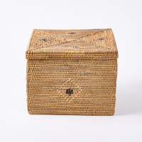 A Square Rattan Basket With A Lid