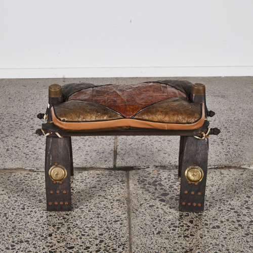 An Saddle Stool With Egyptian Detailing