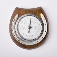 A Vintage Horseshoe Barometer