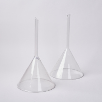 A Set of Two Large Pyrex Glass Funnels