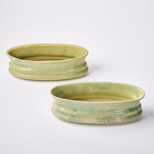 A Pair of Green Glazed Crown Lynn Mantle Vases
