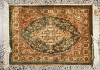 A Small Hand Knotted Persian Entrance Rug