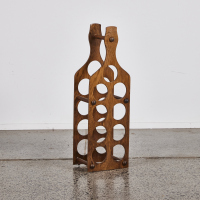 A Vintage Wooden Nine Bottle Wine Rack
