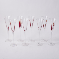 A Set Of Eight Hand-Blown Champagne Flutes