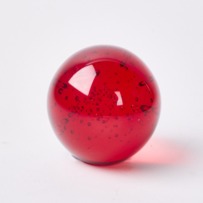 A Large Contorlled Bubble Red Glass Paperweight