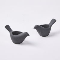 A Pair Of Black Concrete Bird Candle Holders