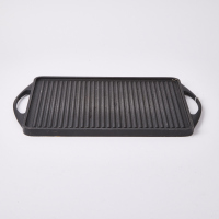 A Large Cast Iron Griddle