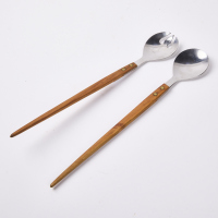 A Pair Of Mid Century Salad Servers