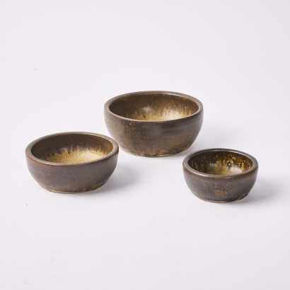 A Trio Of Pottery Dishes