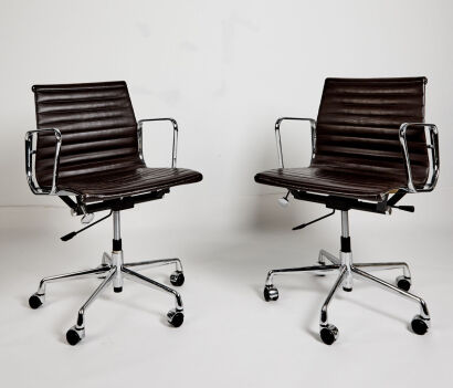 A Pair of Eames Style Group Chairs