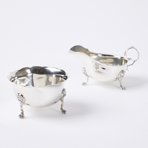 An Antique Sugar Bowl and Creamer