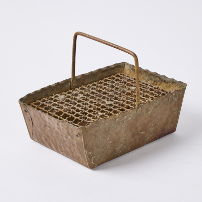 A Small Hammered Copper Planter