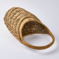 A Rattan Egg Shaped Basket