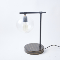 A Designer Table Lamp with Round Globe