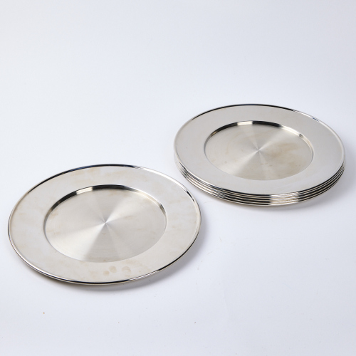 A Collection Of Six Inox Switzerland Stainless Steel Platters