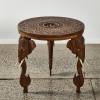 An Anglo-Indian Carved Teak Side Table with Elephant Head Legs