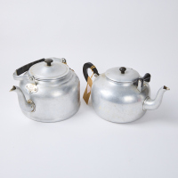 A Pair Of Impressively Large Vintage Tea Pots