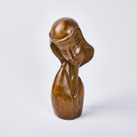 A Mid Century Female Form Carved Bust