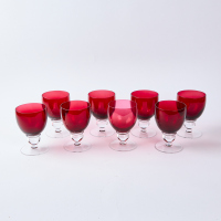 A Set of Stuart Crystal Goblets in Cranberry
