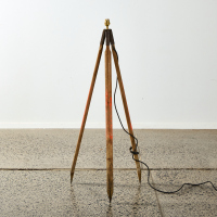 A Wood Stake Base Floor Lamp