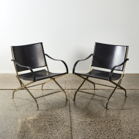 A Pair of Black Foldable Chairs