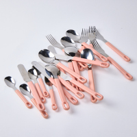 A Collection Of Retro Pink Handled Cutlery