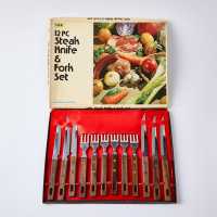 A Twelve Piece Rosewood Steak Knife & Fork Set