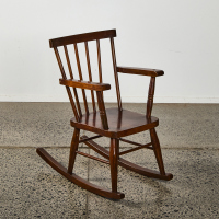 A Vintage New Zealand Made Wooden Childrens Rocking Chair