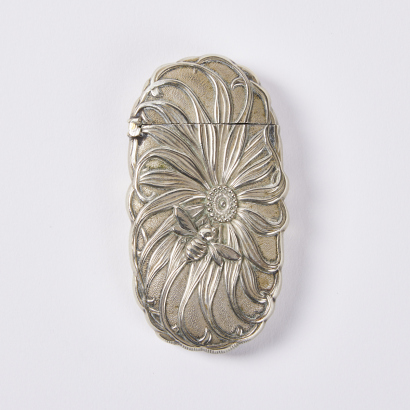 A late 19C-early 20C silver plated 'flower and bee' match safe, Japan