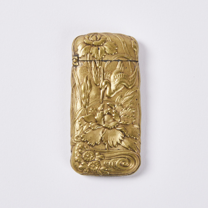 A late 19C-early 20C brass 'Flower and Crane' match safe, Japan