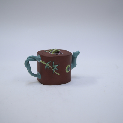 A Chinese old purple clay teapot
