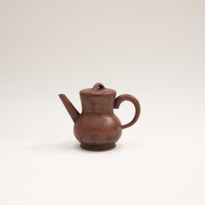 A Chinese old purple clay teapot (Mark at the bottom)