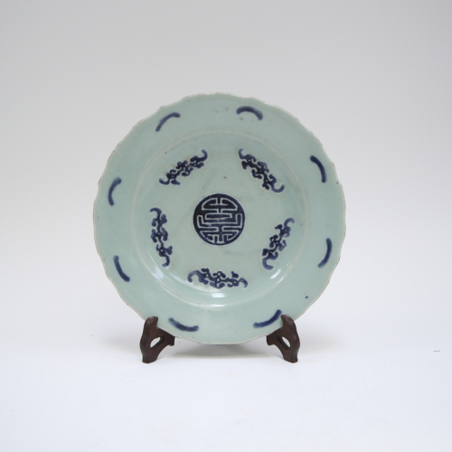 A Chinese mid-Qing dynasty celedone glazed blue and white plate