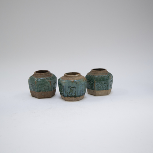 Three Chinese peacock blue glazed hexagonal small jars (one has minor damage)