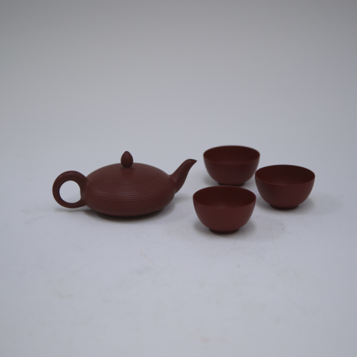 A Chinese purple clay tea pot (Zhang tanpeng mark) +Three tea cups (Zhang yancheng mark)