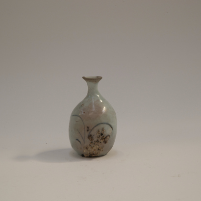 A Japanese 17th century blue and white small vase (minor restoration)