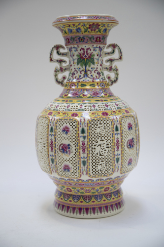 A Chinese famille rose carved double-ear vase