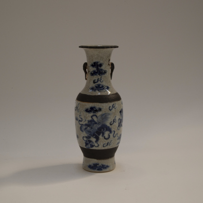 A Chinese blue and white &rsquo;lion' handled vase