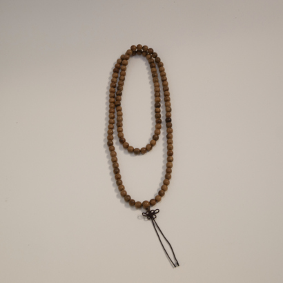 A Chinese sandalwood bead necklace