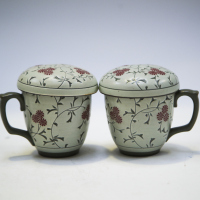 A pair of Chinese carved cover cups