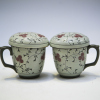 A pair of Chinese carved cover cups