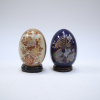 Two Chinese 20th-century painted porcelain eggs