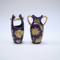 Two Chinese 20th-century blue glazed gilted 'floral' small vases