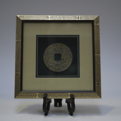 A Chinese old coin decorative piece